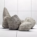 Natural Gray Irregular Stones Decorative Pile Against White Tile Wall and Floor Background