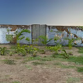Garden Landscape Featuring Weathered Blue Wall Wooden Door Palm Trees And Ferns