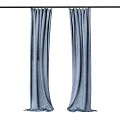 Elegant Blue Curtains With Soft Fabric Hanging On Black Rod For Home Decor