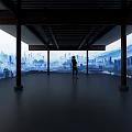 A Person Standing In Spacious Room With Black Pillars Large Windows And City Mountain View
