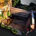 Water Fountain In Natural Rocky Surroundings With Flowing Water And Lush Green Vegetation