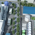 Industrial Manufacturing Plant With Blue Water Tower Storage Tanks Pipes And Green Trees