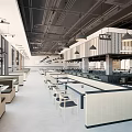 Modern Restaurant Interior With Open Layout Dining Tables Chairs Pendant Lights And Bar Counter