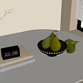 Stack of Books with Black Calendar and Green Pears on Light Round Table Near Window