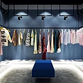 Clothing Store Interior Design With Hanging Clothes Various Colors Blue Walls And Blue Display Bench