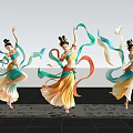 Women dancing in flowing costumes waving colorful ribbons on black background with shiny floor