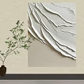 Textured Abstract Wall Art With Ceramic Vase And Green Plant Branch On Neutral Wall
