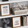 Modern Ornamental Decor Collection with Metal Marble Coral Picture Frames Books Geometric Shapes on Shelf