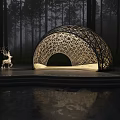 Arched Latticed Sculpture With Lighting And Deer Sculpture In Forest With Water Reflection