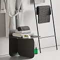 Bathroom Accessories Featuring Grey Bathrobe On Wooden Hanger And Textured Towels On Black Metal Rack