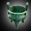 Ancient Bronze Tripod Sculpture With Double Handles And Intricate Engravings