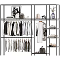 Clothing Rack Displaying Various Clothes Bags And Shoes