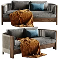 Grey Two Seater Sofa with Wooden Frame Orange Blanket and Blue Cushions