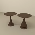 Two Brown Side Tables With Unique Teardrop Base And Round Tabletop In Light Background 3d model