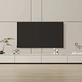 Modern TV Stand With Black TV Potted Plant Decorative Items And Wooden Floor