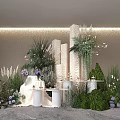 Modern Floral Display With White Columns Green Plants Purple Flowers Marble Countertops And Lighting