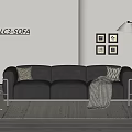 Black Leather Three Seater Sofa With Accent Pillows Striped Throw Blanket Floor Lamp And Wall Art
