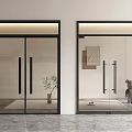 Modern Glass Double Doors with Black Frame in Contemporary Interior Featuring Decorative Plant And Sculpture