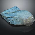 Natural Blue Stone Raw Block With Textured Surface And Green Natural Accents