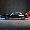 Classic Black Muscle Car Side Rear View with Red Spoiler and Vintage Styling