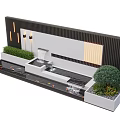 Modern Water Fountain With Black Wooden Backdrop Wall White Platform Green Plants And Warm Lighting