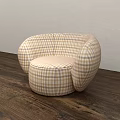 Comfortable Plaid Pattern Bean Bag Chair With Rounded Design On Wooden Floor