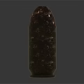 Two Shiny Brass Bullets With Copper Tips Lying On Reflective Dark Surface