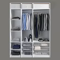 Open Wardrobe Organized With Hanging Shirts Coats Folded Clothes And Storage Baskets