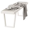 Modern Striped Footstool Designs With Draped Blanket In Light And Dark Tones