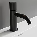 Modern Bathroom Interior With White Sink Round Mirror And Black Faucet