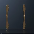 Elegant Golden Door Handles With Curved Metal Design And Shiny Finish