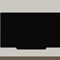 Black TV Wall Mounted on Light Colored Wall With Silver Base and Wooden Floor