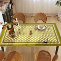 Elegant Dining Table Set With Green White Checkered Tablecloth Rattan Chairs And Decorative Tableware
