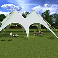 White Double Roof Tent in Green Grass Area with Colorful Flags People and Trees