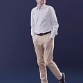 Man in White Shirt Beige Pants Standing Sideways with Hands in Pockets on Blue Background
