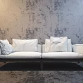 Light Colored Double Sofa With Cushions And Dark Frame Against Textured Gray Wall 3d model