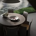 Stylish Round Dining Table Set With Vase Plate And Chairs Near Grass View