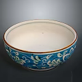 Decorative Ceramic Bowl With Blue Floral Patterns Gold Rim And White Interior