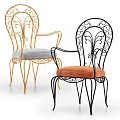 Gold And Black Leisure Chairs With Ornate Iron Frame And Colorful Cushions
