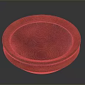 Red Circular Sculpture Carving With Textured Surface And Dark Background 3d model