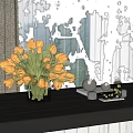 Orange And Red Tulips In Glass Vase On Dark Wooden Table With Small Decorative Items