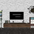 Brown Wooden TV Stand With Black TV Bookshelf And Decorative Gear On Gray Brick Wall