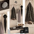 Dark Green Quilted Jacket Hanging On Wooden Peg Rail With Umbrella Hat Bench And Bag