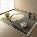 Square Rug With Geometric Pattern On Wooden Floor Featuring Newspaper Vase And Folded Clothes