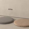 Poliform Round Cushions In Gray And Beige Tones For Modern Interior Decor Settings