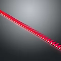 Red LED Strip Light With Multiple Small LEDs Neatly Arranged On Dark Background