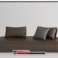 Modern Brown And Beige Sectional Sofa With Decorative Pillows And Throw Blanket