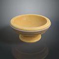 Elegant Yellow Stone Bowl Shaped Sculpture Carving With Intricate Patterns And Decorative Base
