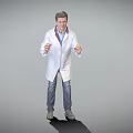 Man in White Doctor Coat With Stethoscope Standing Against Gray Background Gesturing