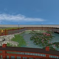 Park Landscape With Lotus Pond Walking Path Railing And Greenery Under Blue Sky